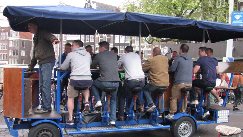Cyclists combining training with social life on a beer bike